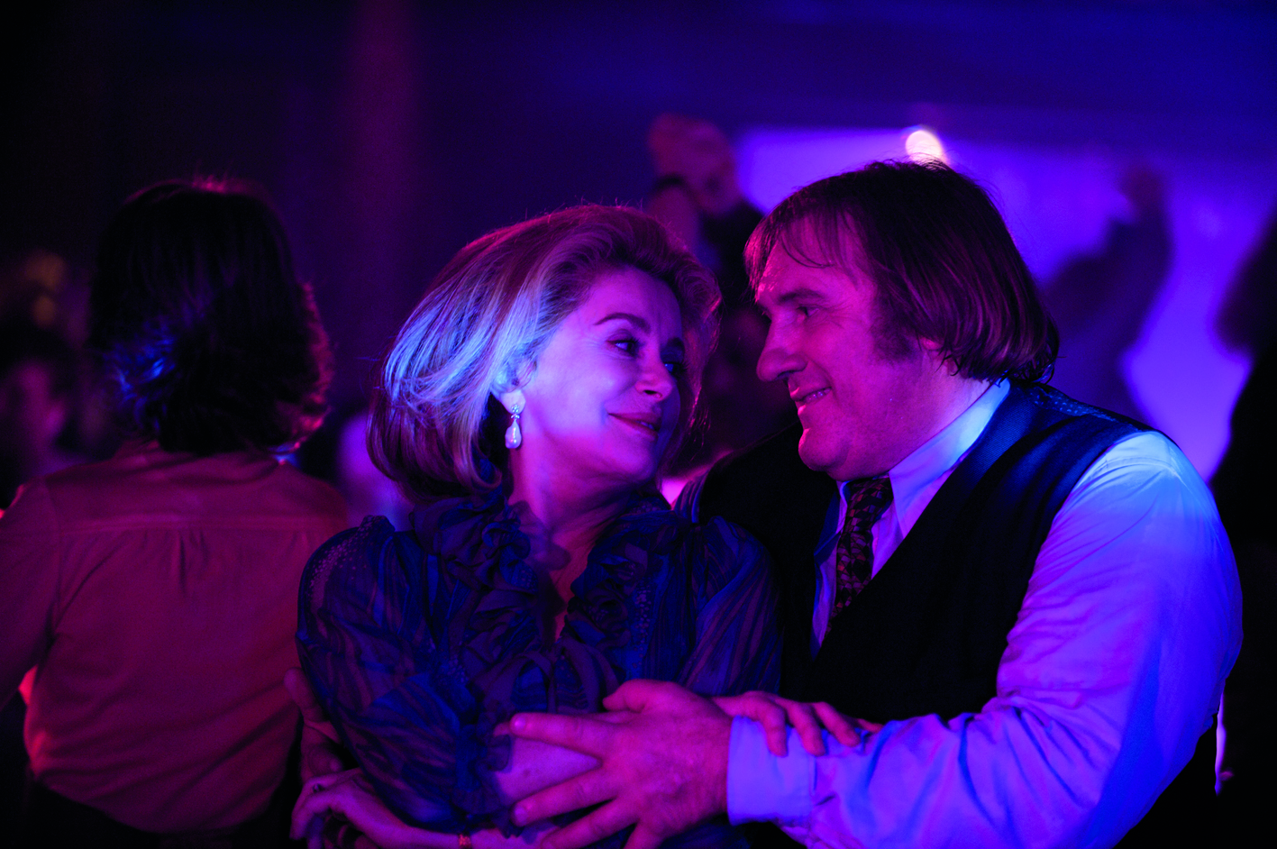 Catherine Deneuve and Gérard Depardieu in Potiche (2010)