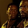 Eriq Ebouaney and Hakeem Kae-Kazim in The Front Line (2006)