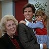 Pierce Brosnan, Doris Roberts, and Judith Barsi in Remington Steele (1982)