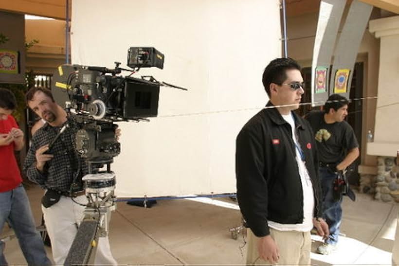 Lance (1st A.D.) gets ready to shoot while Maximo Munzi (D.P.) finishes setting the camera on the location-set of MYSTERY WOMAN: VISION OF A MURDER in Simi Valley, CA.