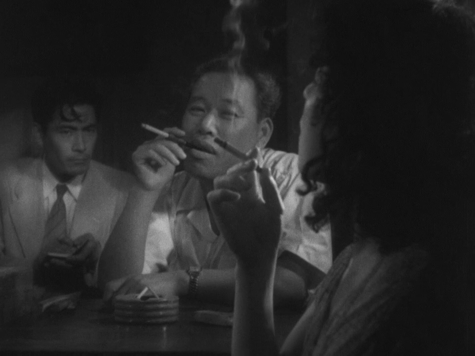 Toshirô Mifune, Noriko Sengoku, and Takashi Shimura in Stray Dog (1949)