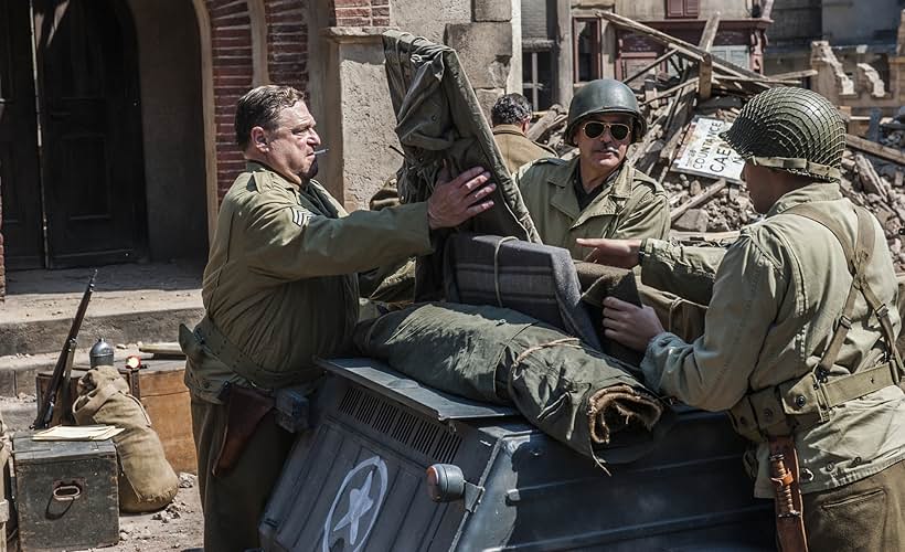 George Clooney, John Goodman, and Dimitri Leonidas in The Monuments Men (2014)