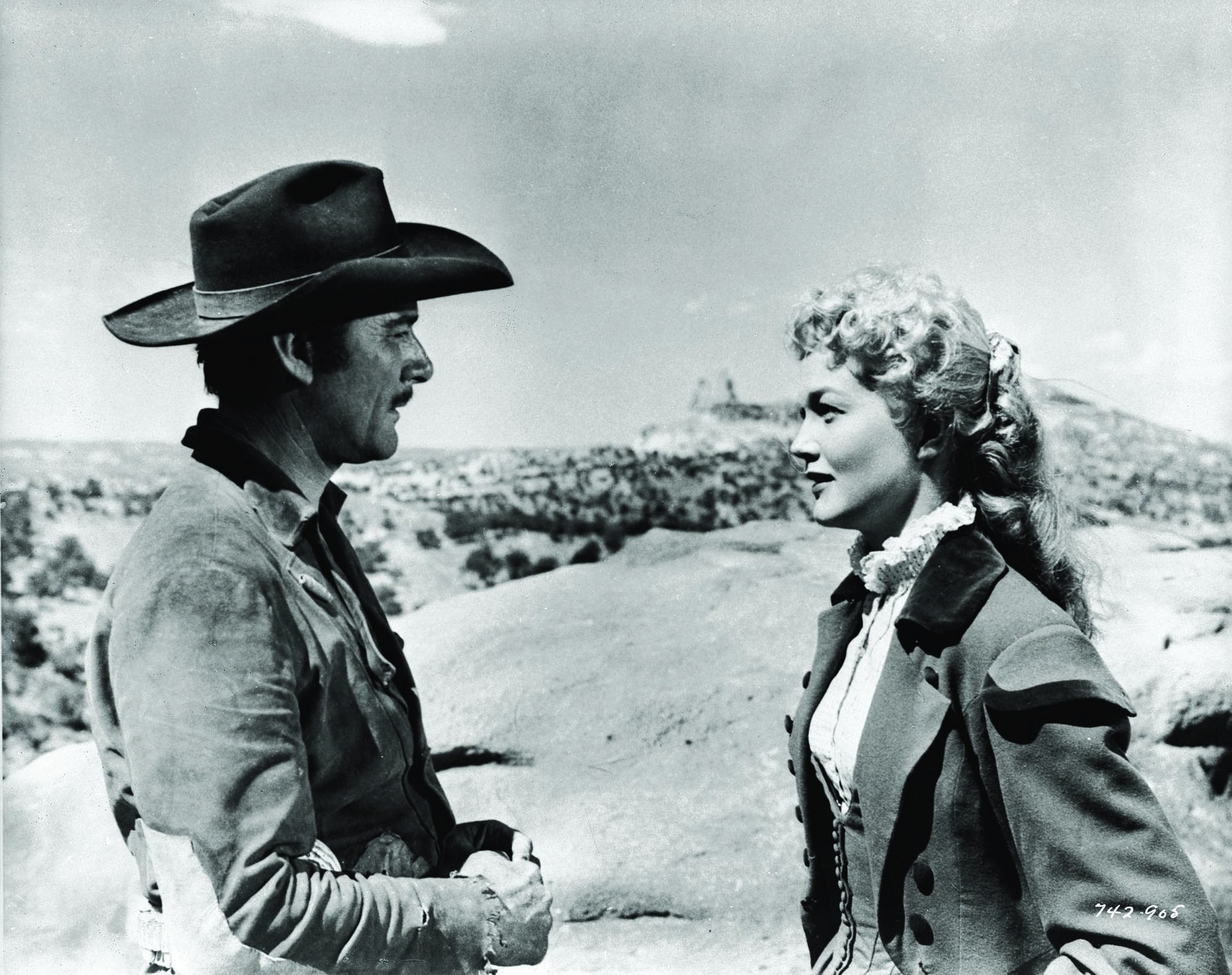 Errol Flynn and Patrice Wymore in Rocky Mountain (1950)