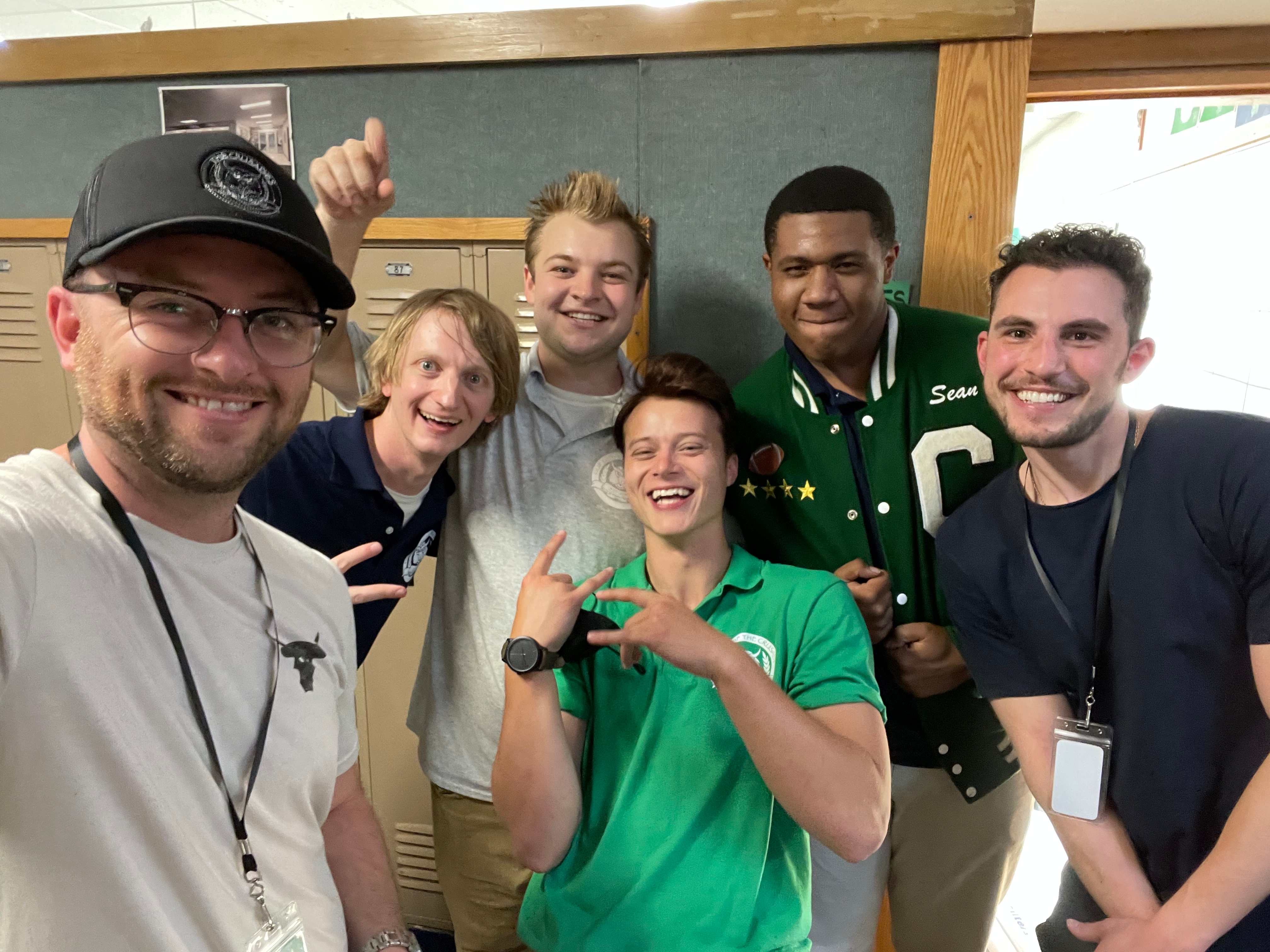 Producer Brent Madison and director Leo Milano with Adam Shalzi, Ryan Ashton, Rudy Pankow, and Khalil Everage on The Crusades (2023) set.