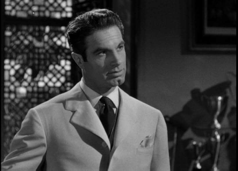 Charles Korvin in Temptation (1946)