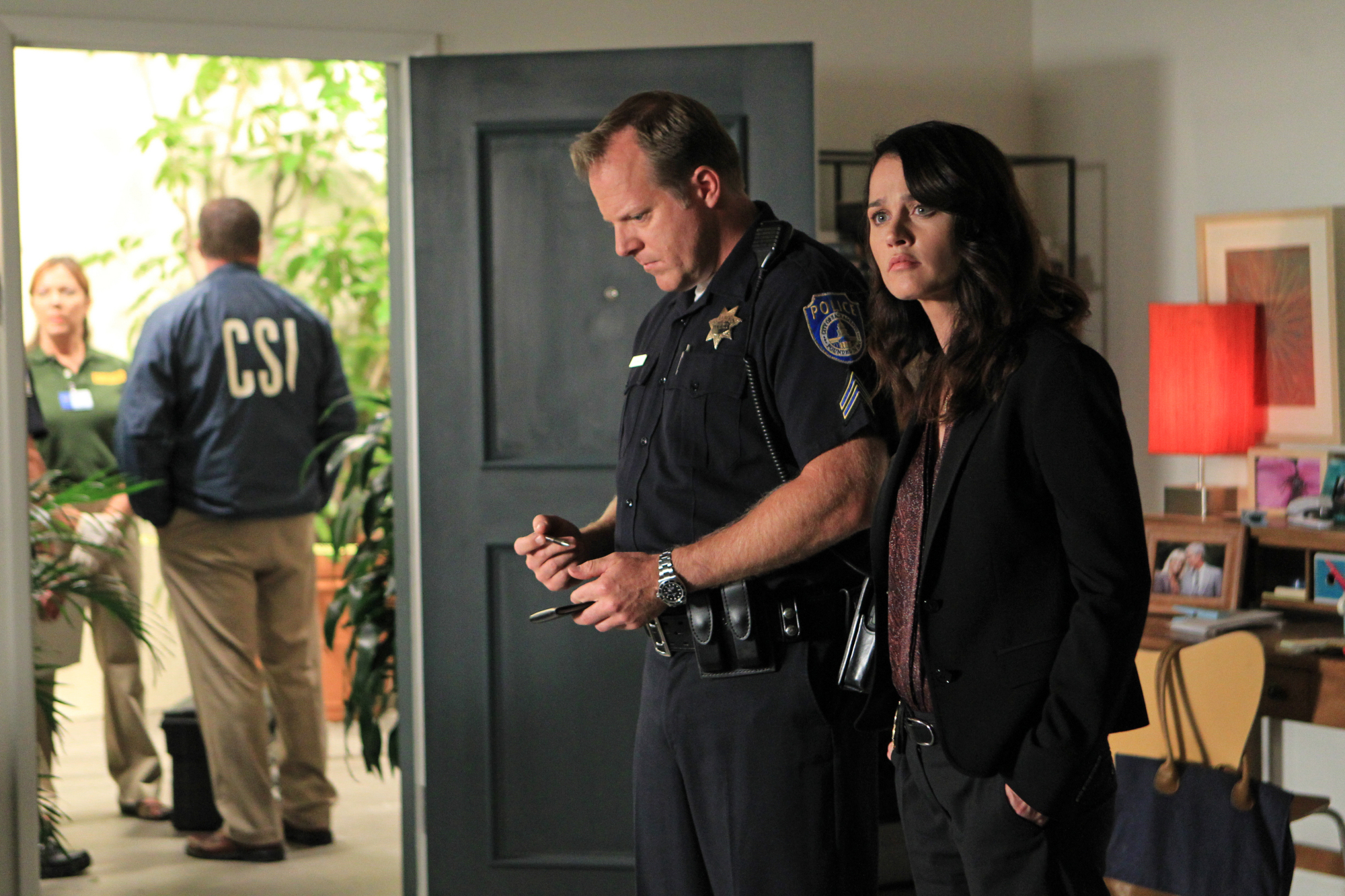 Robin Tunney and Jon Curry in The Mentalist (2008)