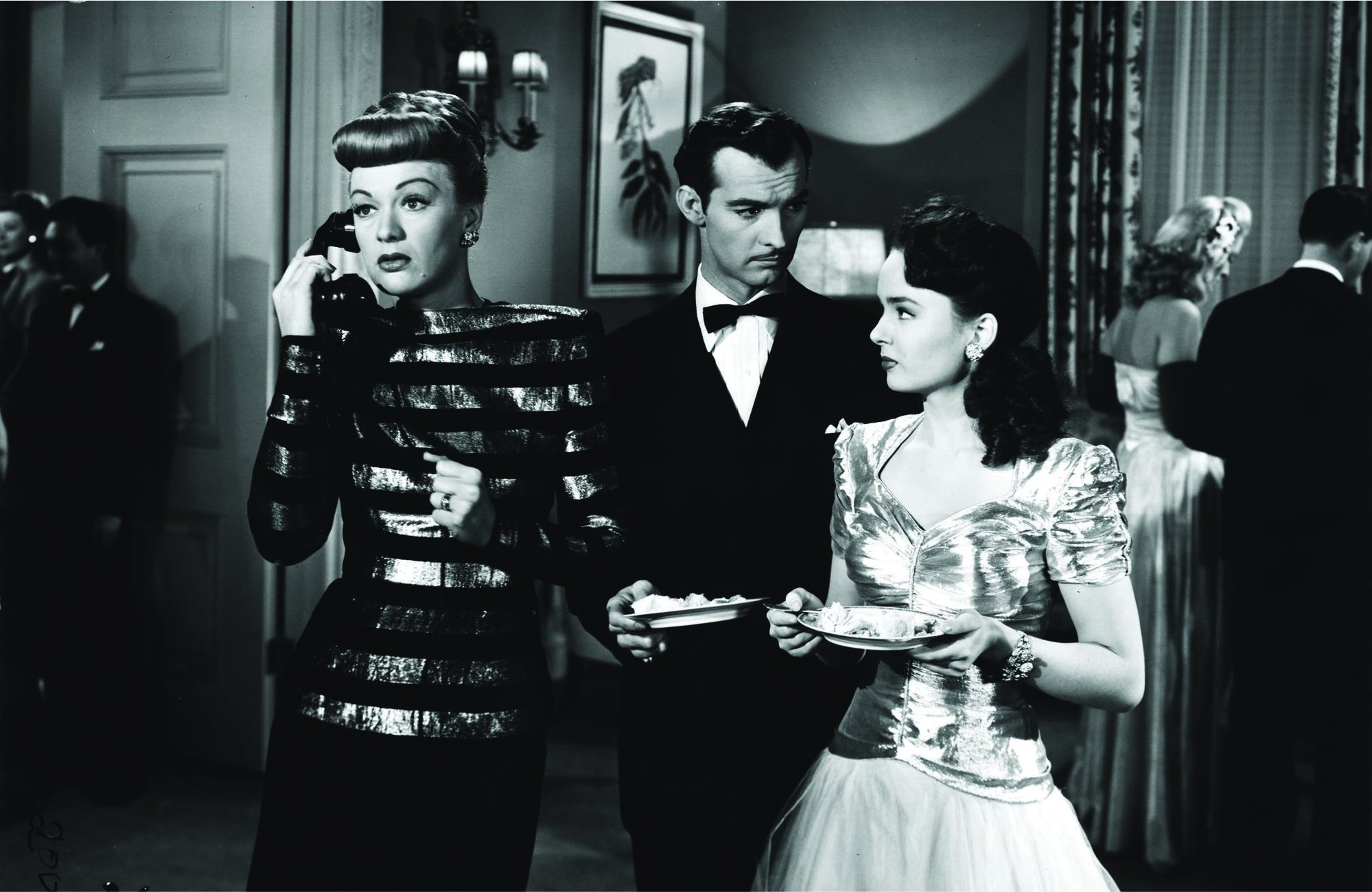 Eve Arden, Ann Blyth, and Zachary Scott in Mildred Pierce (1945)