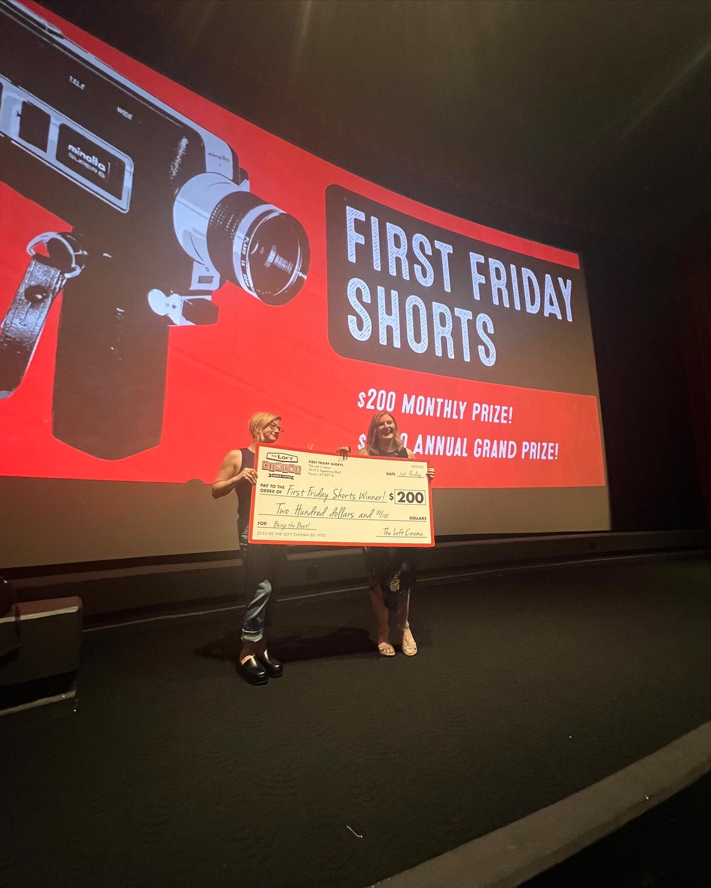 Amy Crater and Courtney Harmon accept an award for Jessie at The Loft Cinema’s First Friday Shorts in August of 2023.