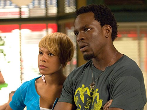 Gbenga Akinnagbe and Toni Trucks in Barbershop (2005)