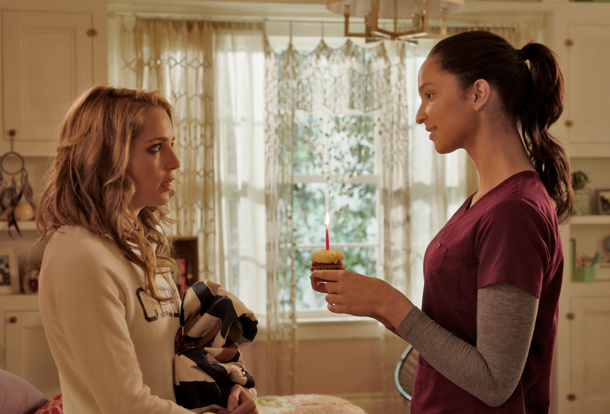 Jessica Rothe and Ruby Modine in Happy Death Day (2017)