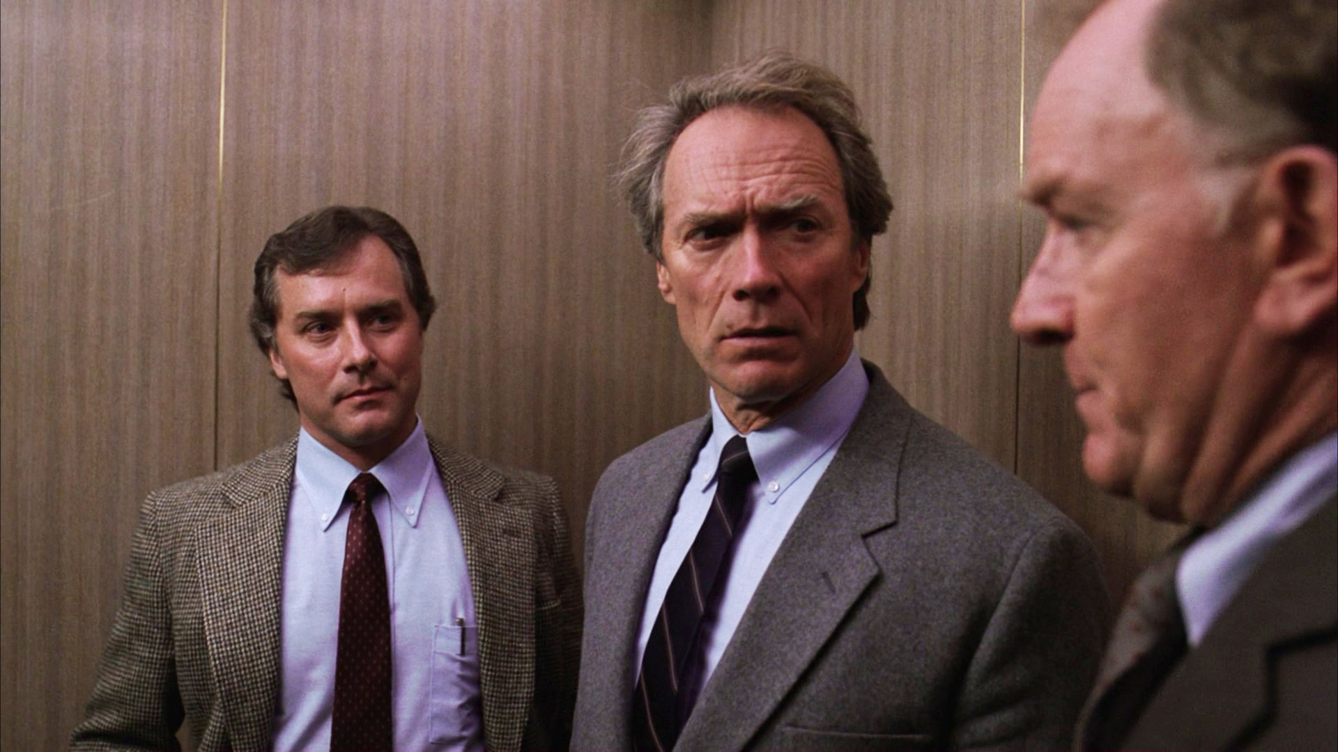 Clint Eastwood, Michael Currie, and Michael Goodwin in The Dead Pool (1988)