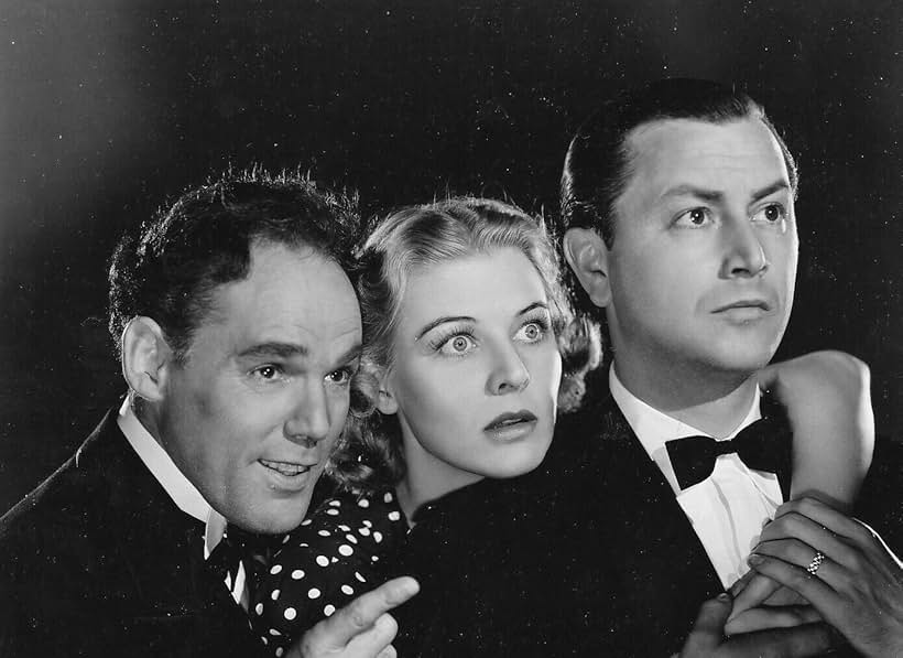 Robert Young, Henry Hull, and Florence Rice in Miracles for Sale (1939)