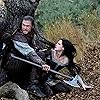 Kristen Stewart and Chris Hemsworth in Snow White and the Huntsman (2012)