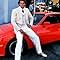 LORENZO LAMAS ON THE SET OF FALCON CREST WITH HIS PORSCHE 944 / 1983