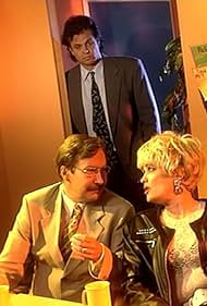 Tapio Liinoja, Irina Milan, and Erkki Saarela in Samppanjaa ja vaahtokarkkeja (1995)