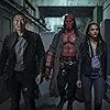 Daniel Dae Kim, David Harbour, and Sasha Lane in Hellboy (2019)