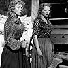 Julie Bishop and Denise Darcel in Westward the Women (1951)