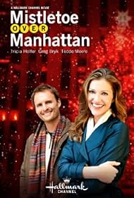 Greg Bryk and Tricia Helfer in Mistletoe Over Manhattan (2011)