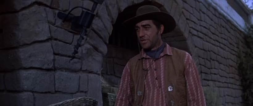 Richard Devon in The Comancheros (1961)