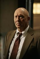 Dann Florek in Law & Order: Unità Speciale (1999)