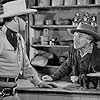 Clayton Moore and Jean De Briac in The Lone Ranger (1949)