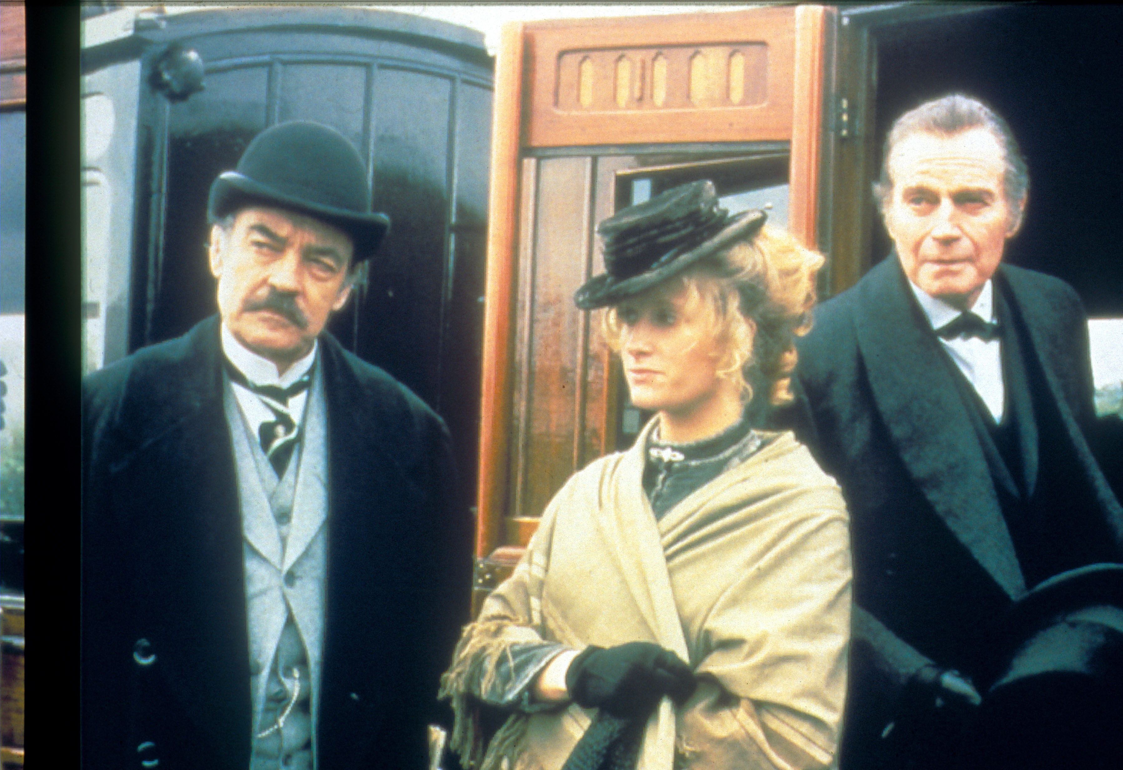 Charlton Heston, Susannah Harker, and Richard Johnson in The Crucifer of Blood (1991)