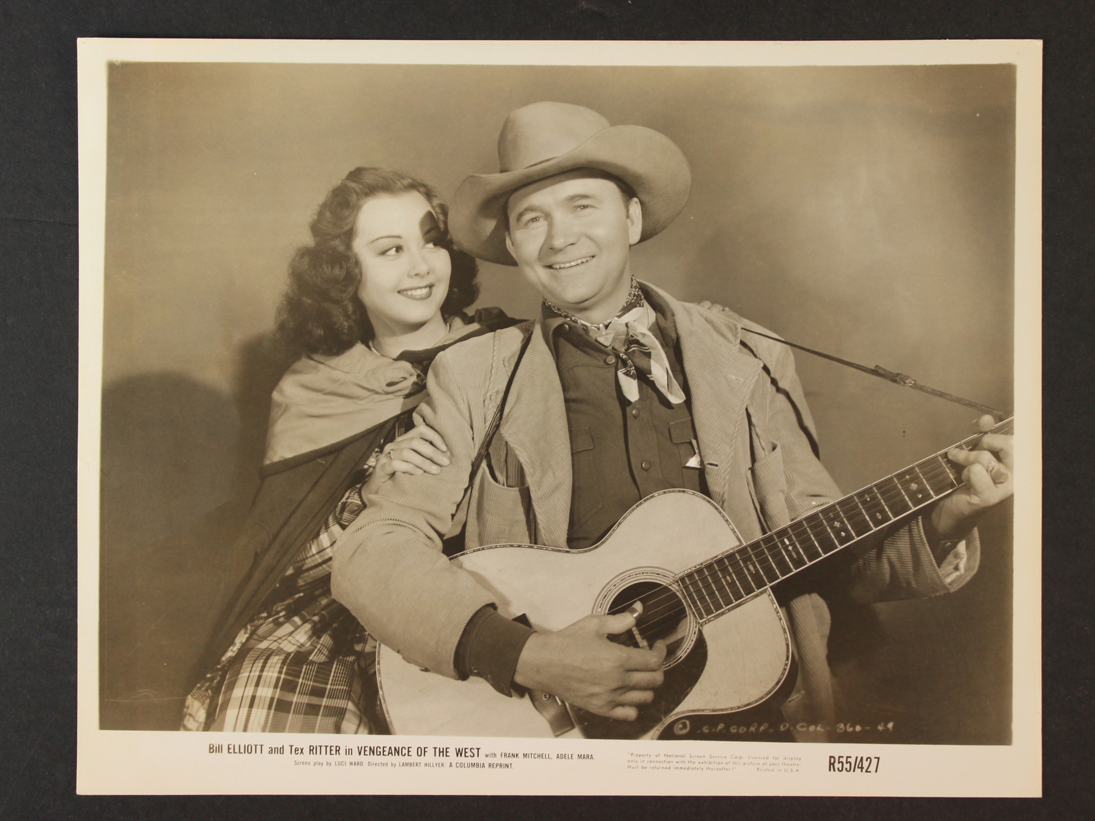 Adele Mara and Tex Ritter in Vengeance of the West (1942)