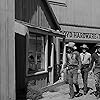 Lee Van Cleef, Ian MacDonald, Robert J. Wilke, and Sheb Wooley in High Noon (1952)