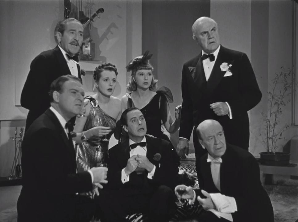 Mary Astor, Berton Churchill, Joyce Compton, William Gargan, John Hubbard, Donald Meek, and Adolphe Menjou in Turnabout (1940)