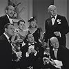 Mary Astor, Berton Churchill, Joyce Compton, William Gargan, John Hubbard, Donald Meek, and Adolphe Menjou in Turnabout (1940)