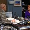 Reba McEntire and Larry Wilmore in Malibu Country (2012)