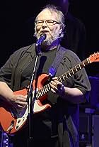 Walter Becker of Steely Dan performs during the band's 'Jamalot Ever After Summer Tour 2014' at Concord Pavilion on July 10, 2014 in Concord, Calif. 