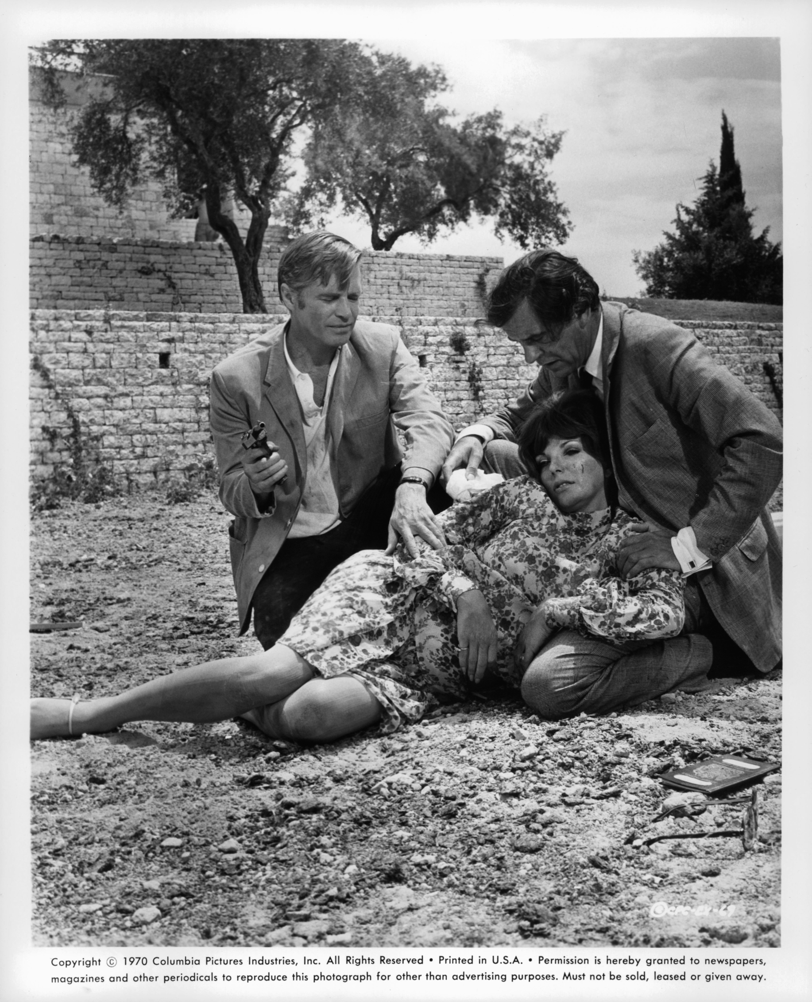 George Peppard, Joan Collins, and George Baker in The Executioner (1970)