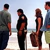 Dale (David Alan Basche), Senna (Patrick Gallo), Paige (CeCe Pleasants) and Seth (Patrick Warburton) seek answers on the beach