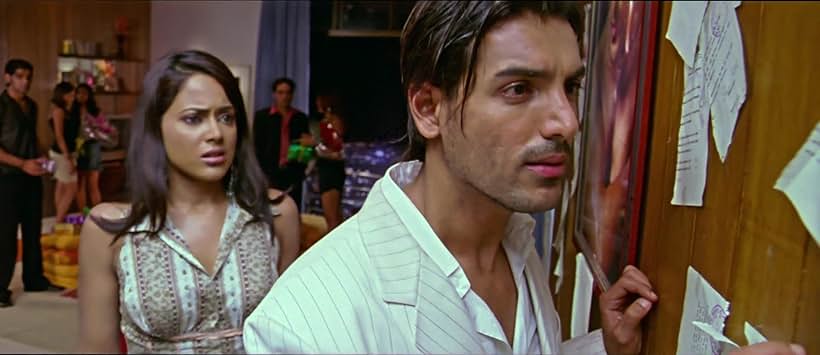 Sameera Reddy and John Abraham in Taxi No. 9 2 11: Nau Do Gyarah (2006)