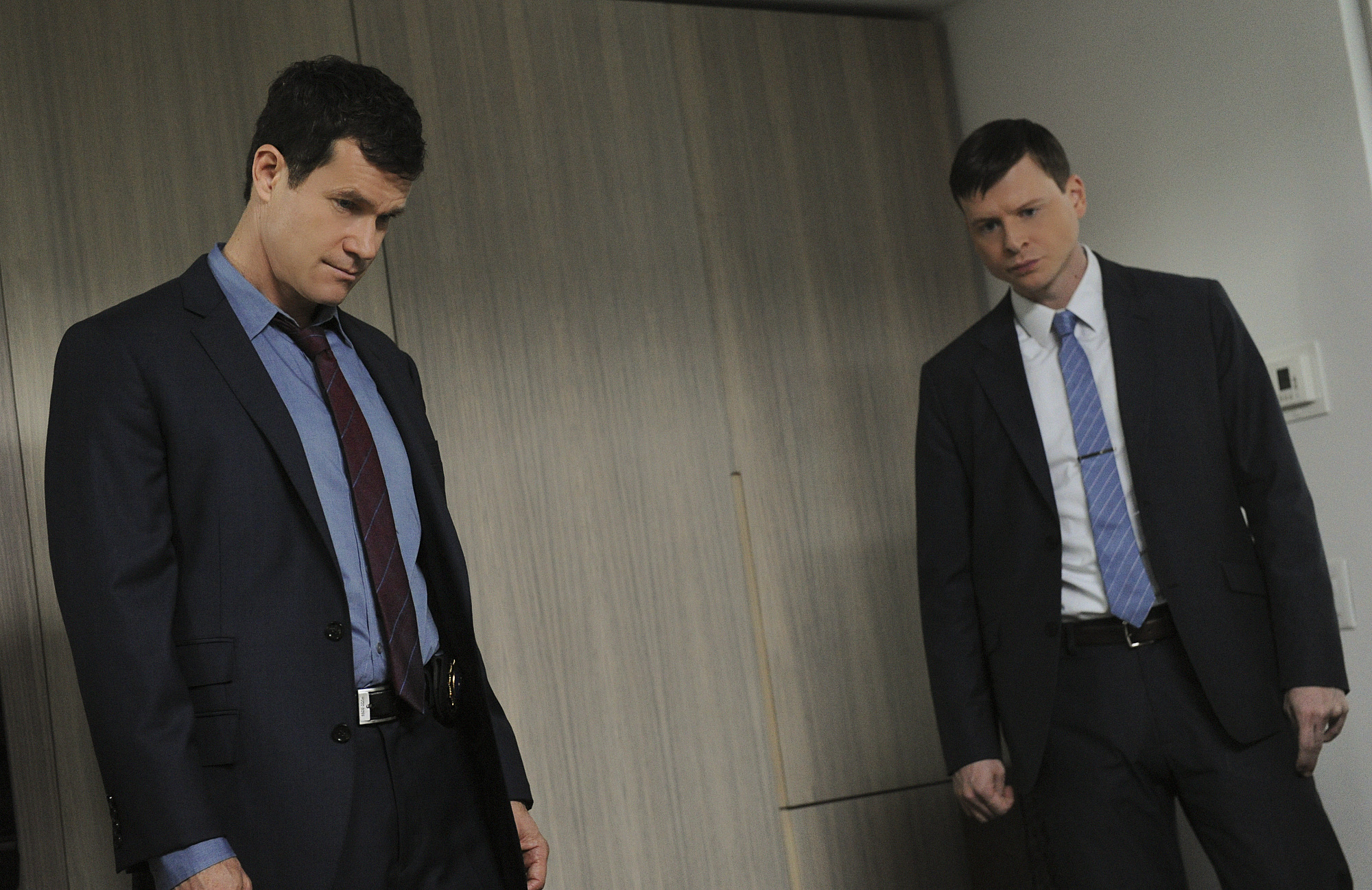 Kevin Rankin and Dylan Walsh in Unforgettable (2011)