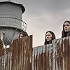 Norman Reedus, Alanna Masterson, Eleanor Matsuura, and Nadia Hilker in The Walking Dead (2010)