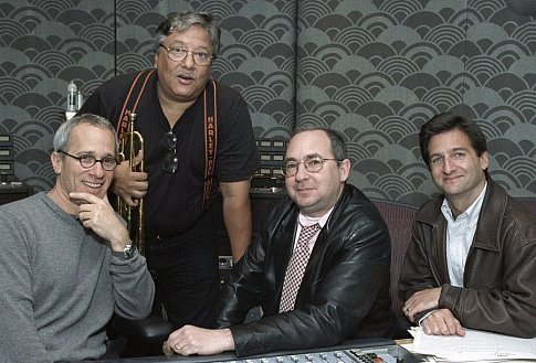 Composer James Newton Howard (left) and Latin jazz legend Arturo Sandoval (center left) collaborated with Sonnenfeld (center right) and producer Tom Jacobson (right). 