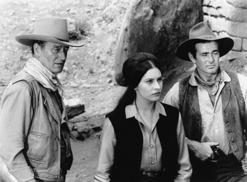 John Wayne, Ina Balin, and Stuart Whitman in The Comancheros (1961)