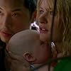 Emilie de Ravin and Ken Leung in Lost (2004)