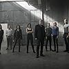 Ming-Na Wen, Henry Simmons, Clark Gregg, Iain De Caestecker, Luke Mitchell, Adrianne Palicki, Nick Blood, Brett Dalton, Chloe Bennet, and Elizabeth Henstridge in Agents of S.H.I.E.L.D. (2013)