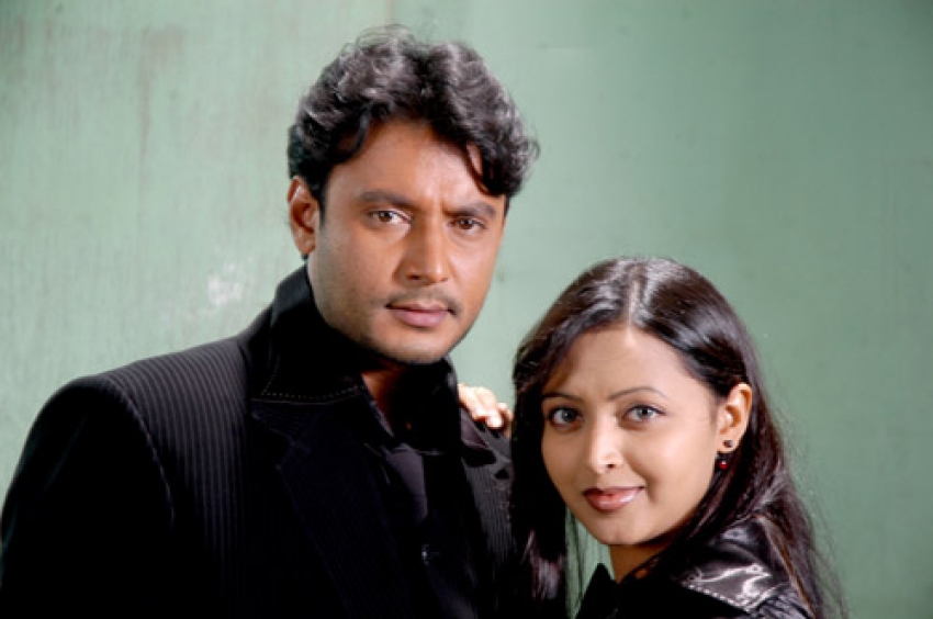 Navya Nair and Darshan Thoogudeep in Boss (2011)