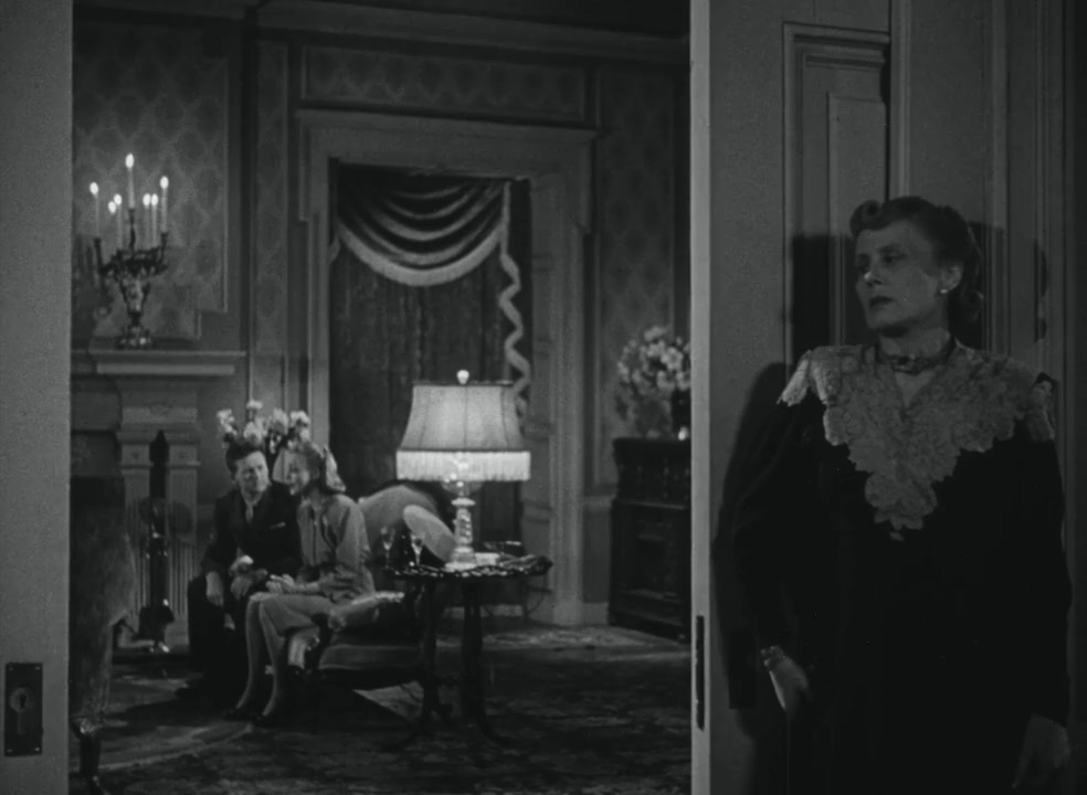 Virginia Grey, William Terry, and Helene Thimig in Strangers in the Night (1944)