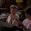 Molly Ringwald and Anthony Michael Hall in Sixteen Candles (1984)