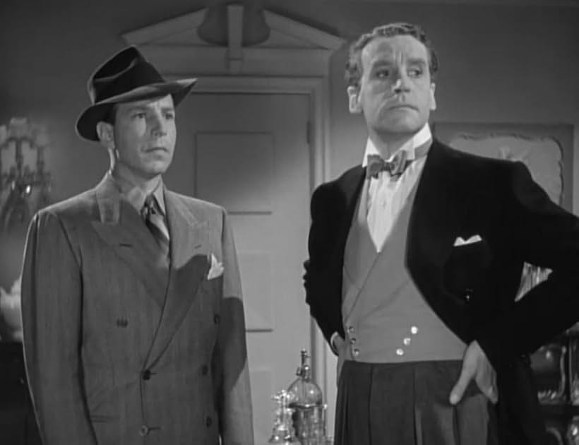 Henry Daniell and Lloyd Nolan in Dressed to Kill (1941)