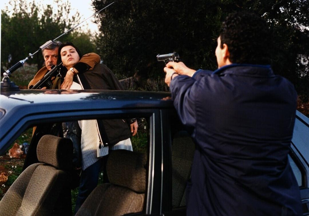 Francesco Benigno, Rosalinda Celentano, and Giancarlo Giannini in Palermo-Milan One Way (1995)