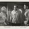 Ronald Reagan, Broderick Crawford, and Art Baker in Night Unto Night (1949)