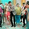 Shah Rukh Khan, Ghanshyam Nayak, Dilip Joshi, Disha Vakani, Sailesh Lodha, Amit Bhatt, Mayur Vakani, Neha Mehta, Bhavya Gandhi, Shyam Pathak, Kush Shah, and Ambika Ranjankar in Taarak Mehta Ka Ooltah Chashmah (2008)