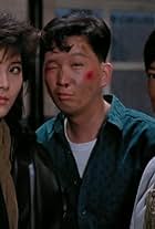 Cynthia Khan, Kai-Chi Liu, and Yat-Chor Yuen in Wong ga si je IV: Jik gik jing yan (1989)