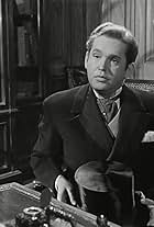 John Penrose in Kind Hearts and Coronets (1949)